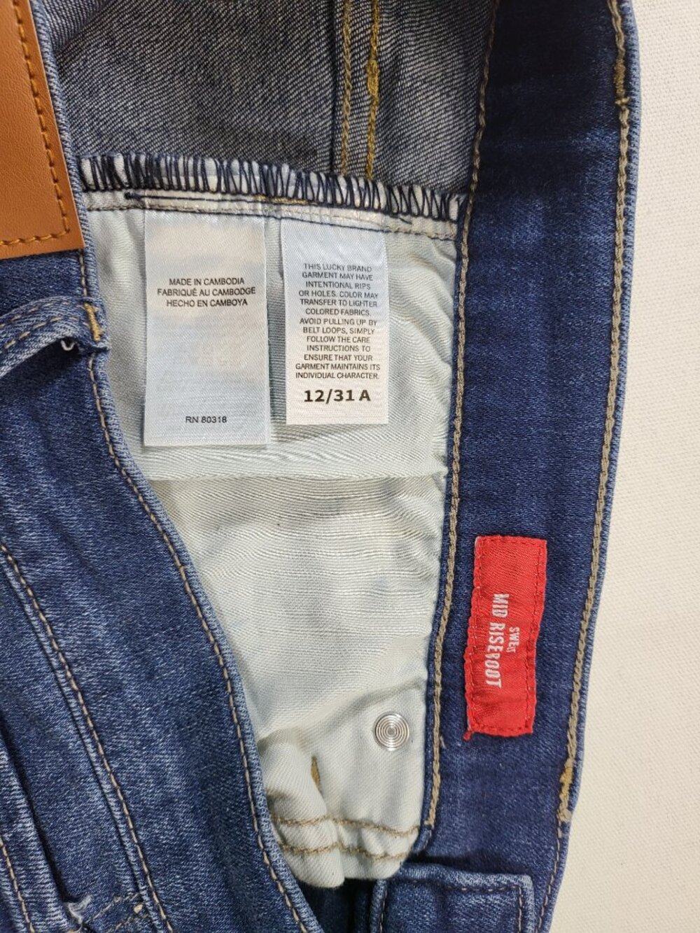 Lucky Brand Mid Rise Sweet Bootcut Jeans Raw Hem Blue Denim Size 12 - Picture 8 of 9